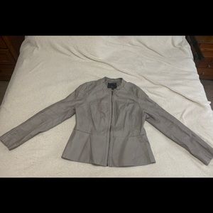 Light gray flair waist jacket size XL fits like a woman’s size 12-14.
